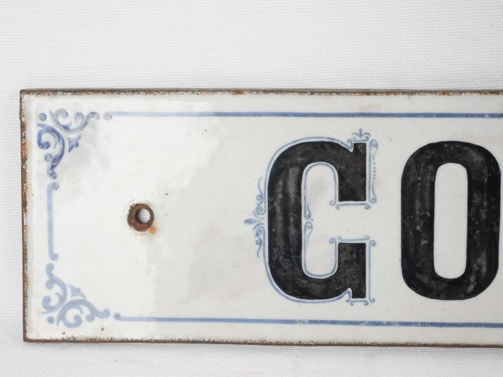 Ornate 19th-century apartment signage