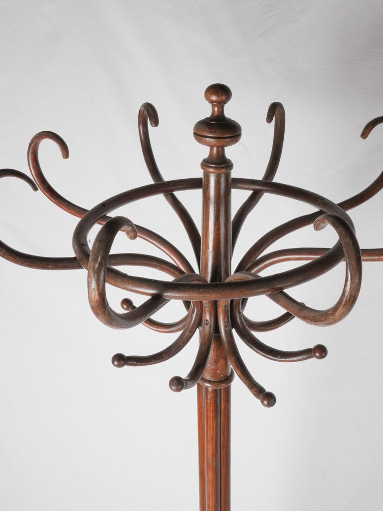 Stylish rotating crown coat storage