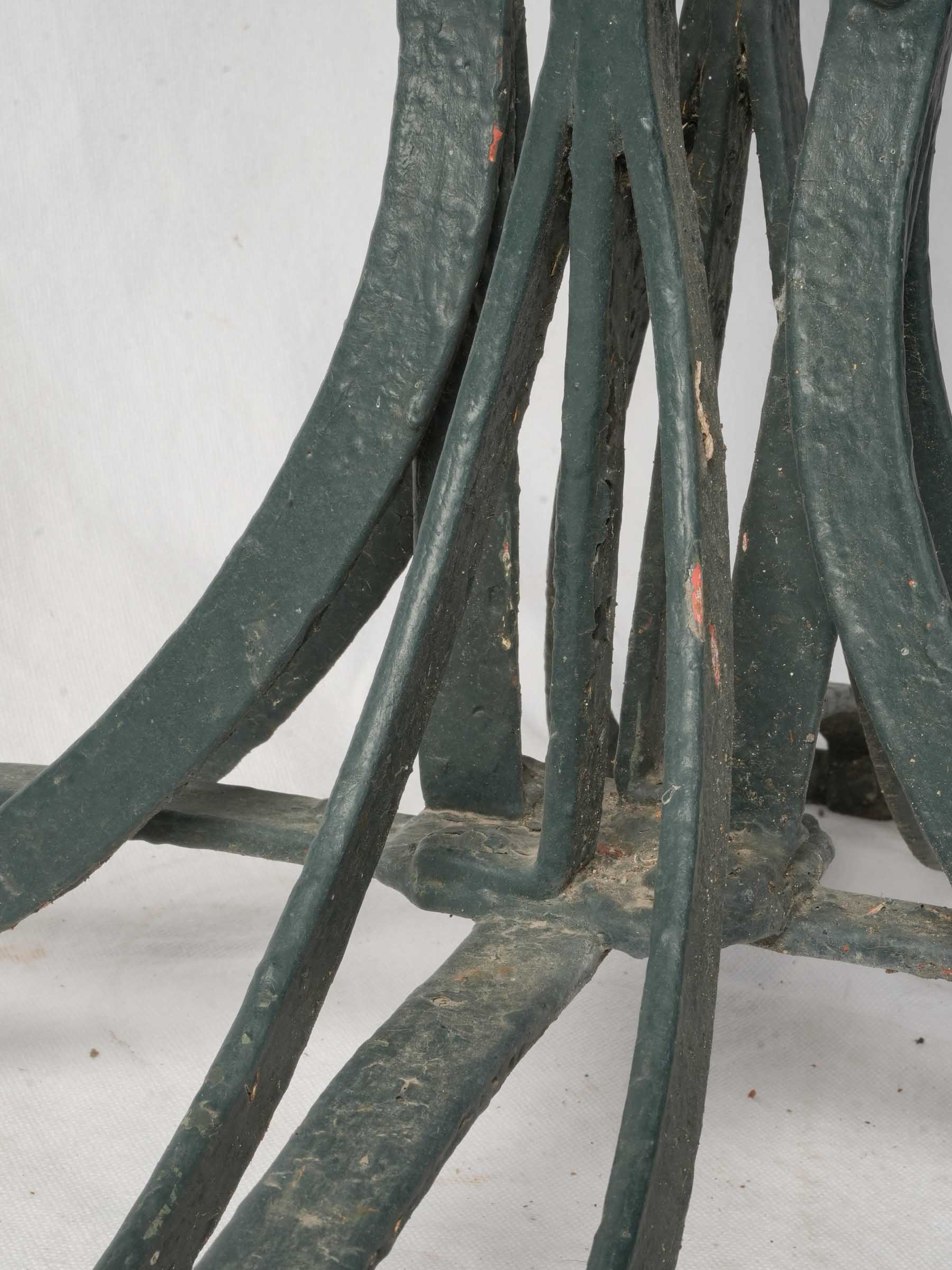 Riveted ornate metalwork table