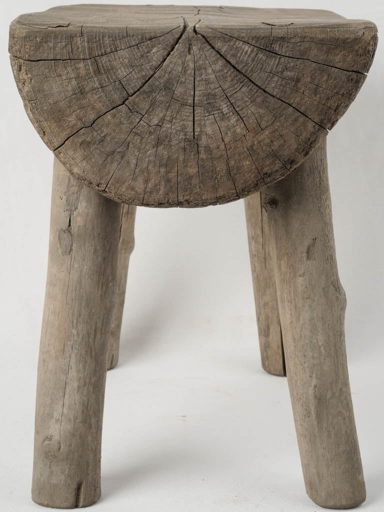 Weathered driftwood half log console table