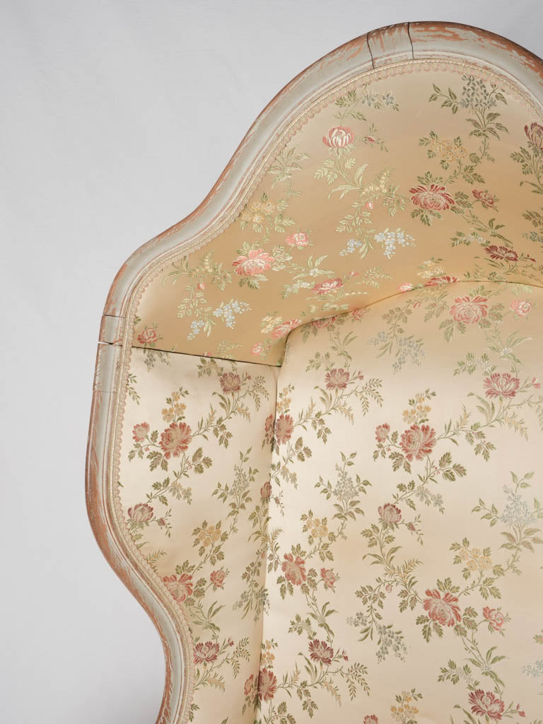 Sophisticated, antique wingback armchair