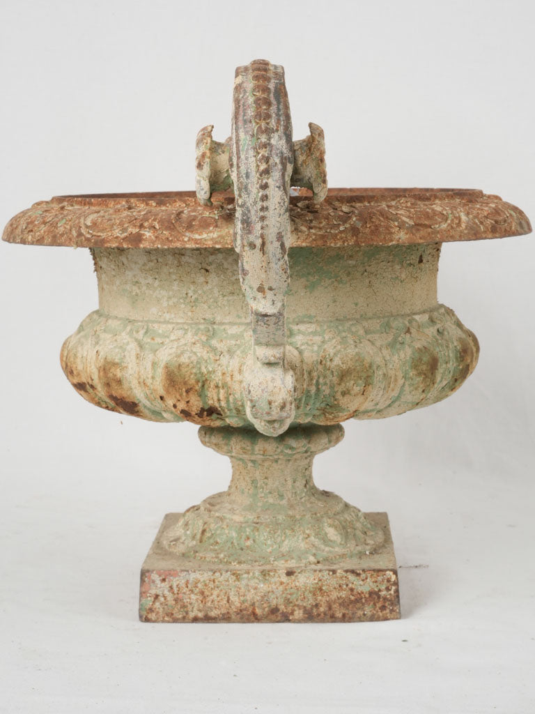 Patina-finished historical garden urns