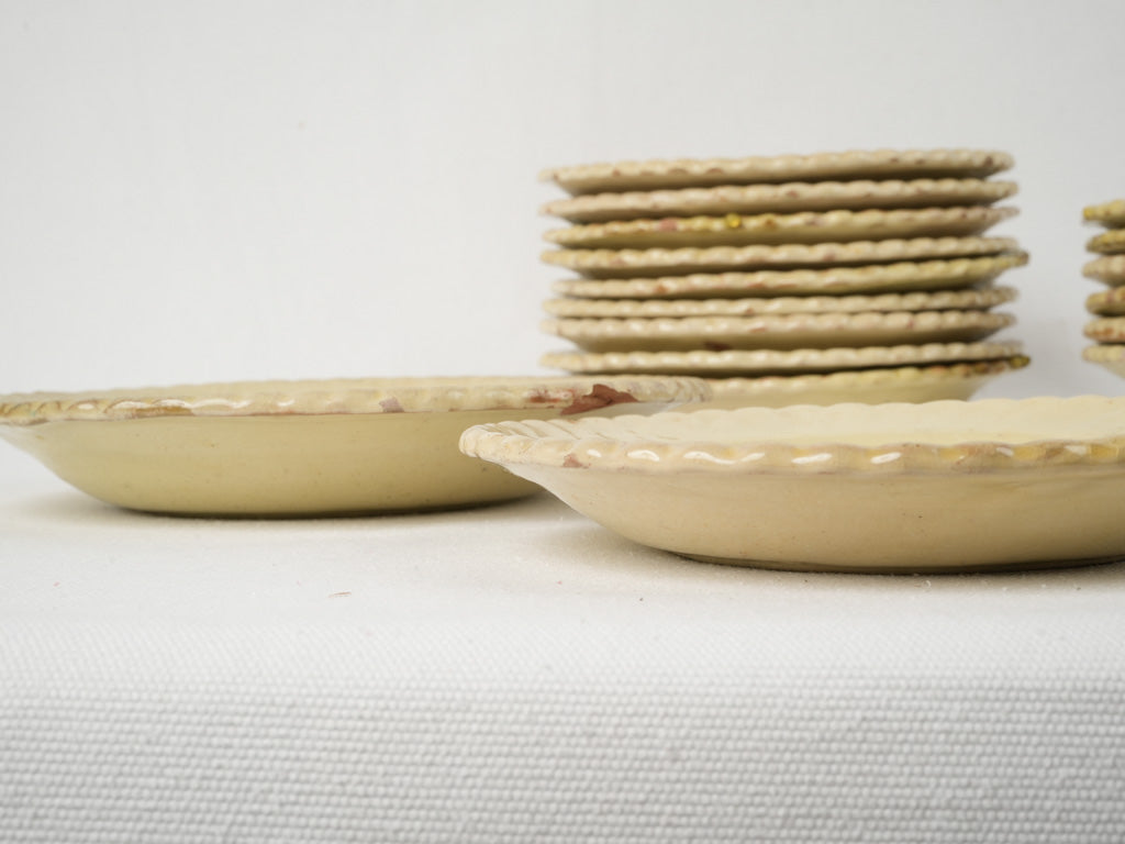 Decorative, aged, yellow-glazed side plates