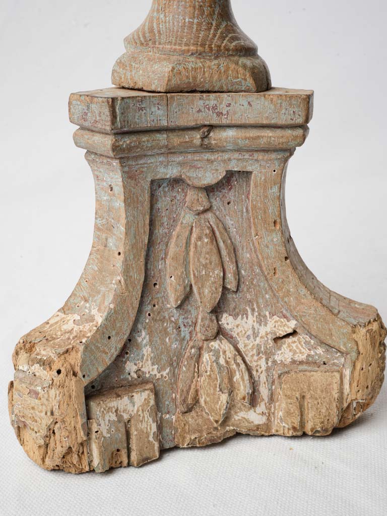 Artful antique wood candlestick