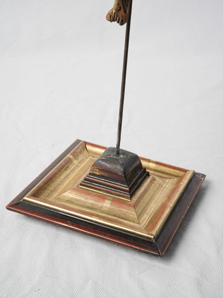 Elegant tiered base statue