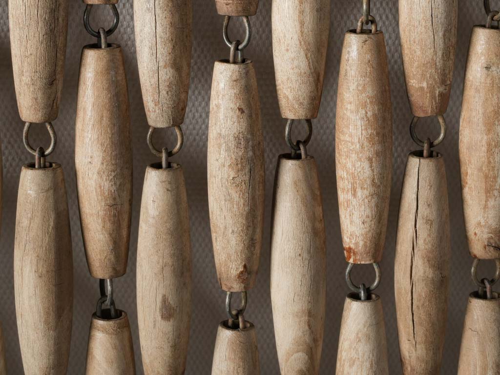 Understated boxwood bead curtain