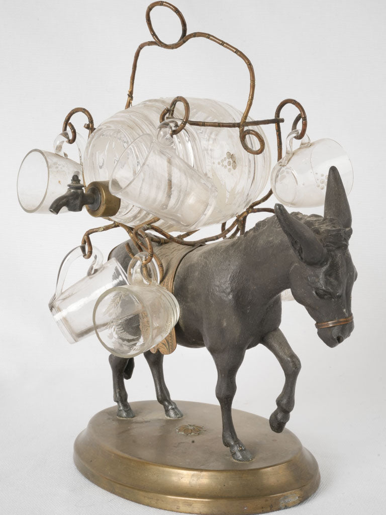 Antique ormolu-finished donkey liqueur stand
