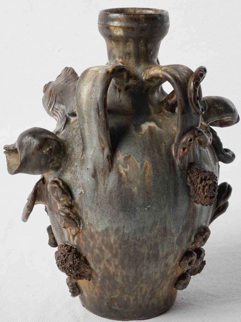 Expressive relief marine motif cruche