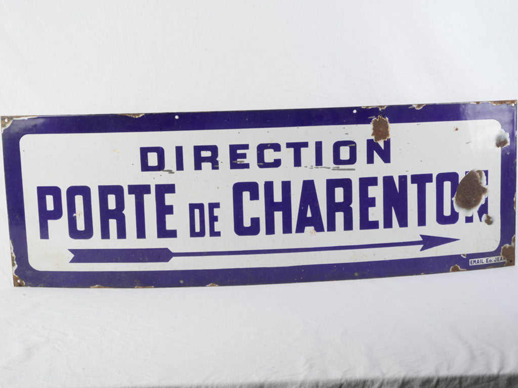 Antique enameled steel direction sign