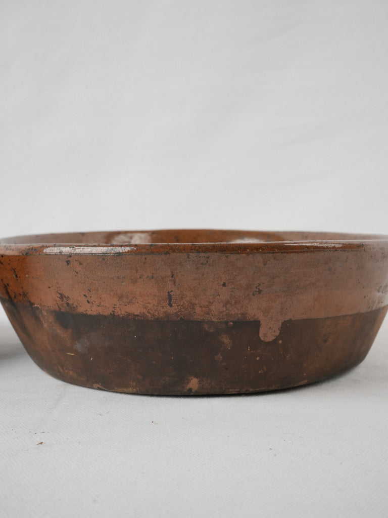 Weathered dark brown oval gratinware