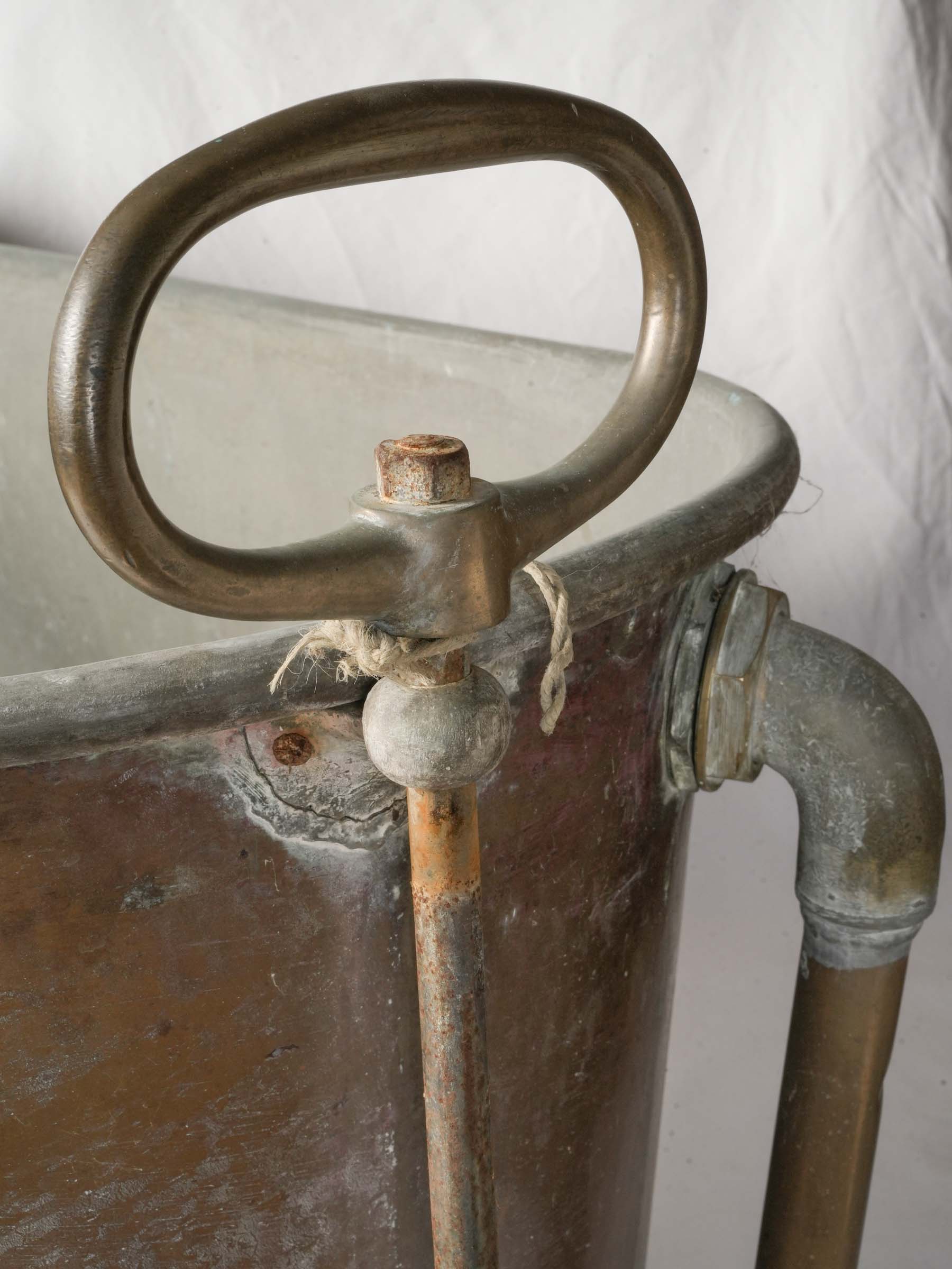 Rustic copper tub with wheels
