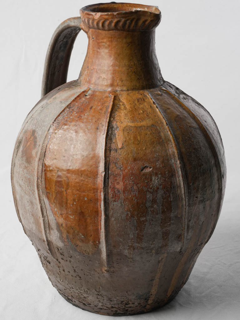 Rustic antique terracotta oil jug