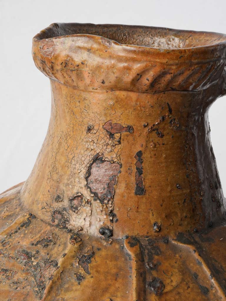 Classic elongated neck oil vessel