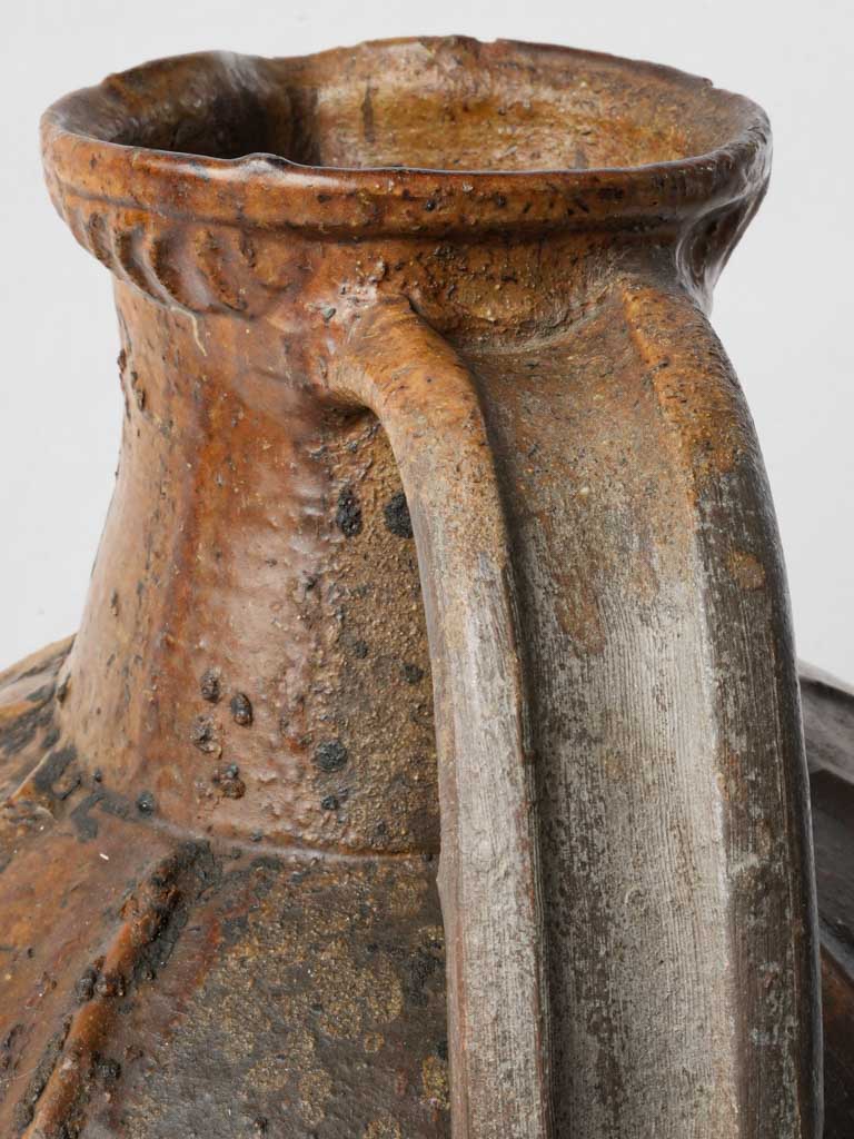 Distressed patina terracotta jar