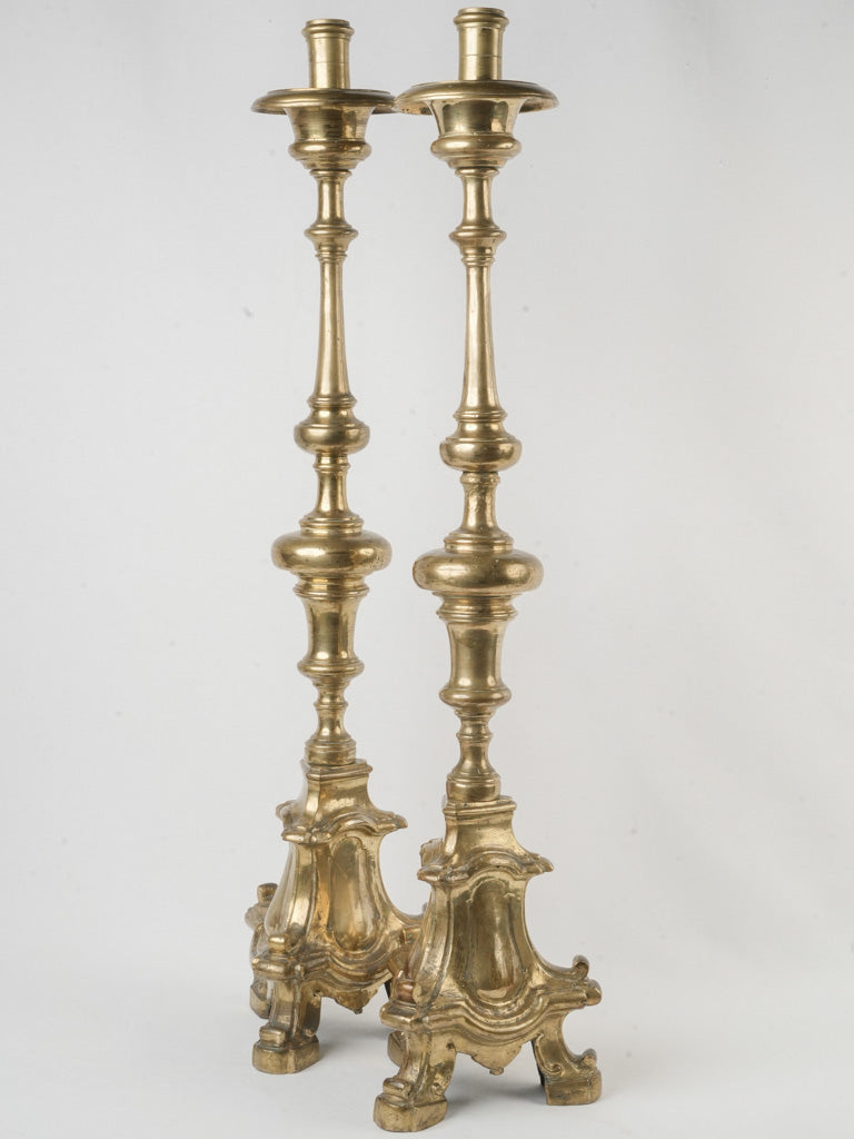 Regal antique bronze candelabra pair