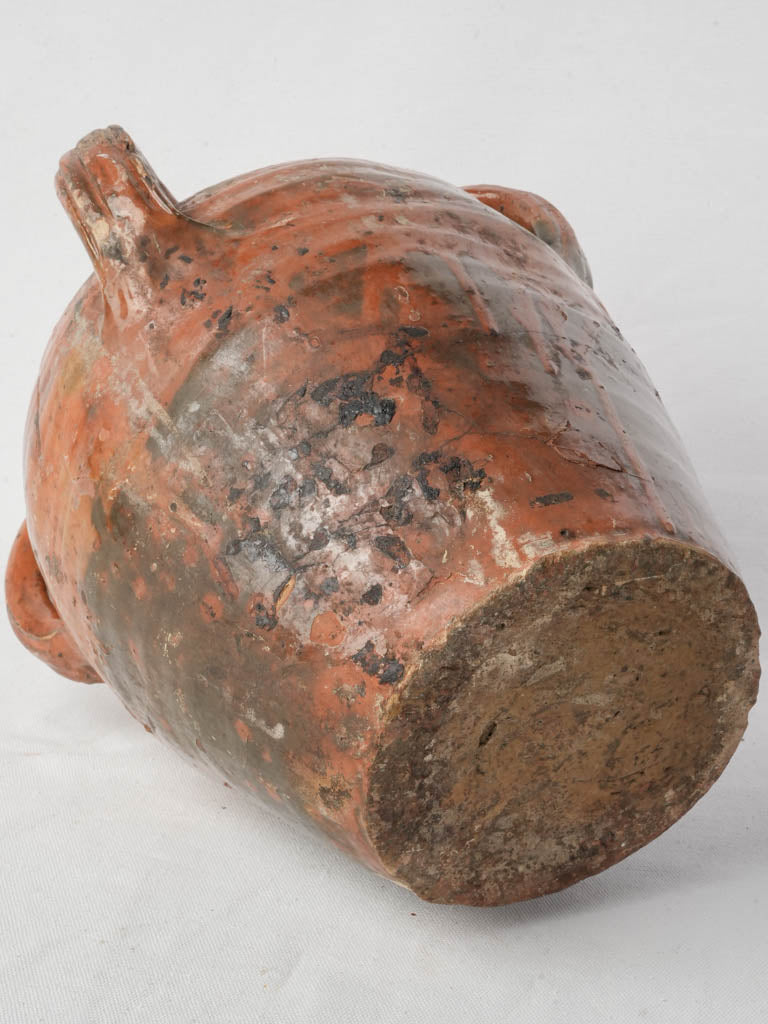 Warm-toned antique French water jar