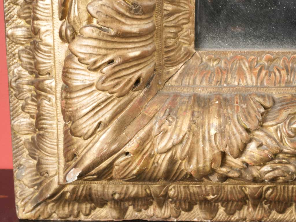 Richly carved decorative mirror