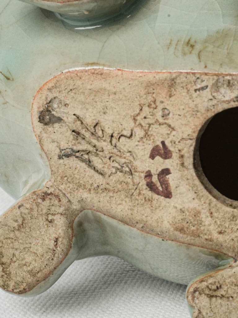 Subtly aged celadon rabbit display
