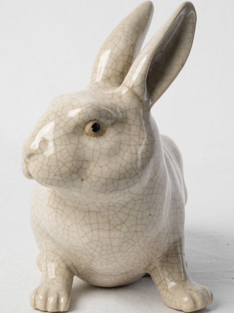 Elegant off-white ceramic rabbit statuette