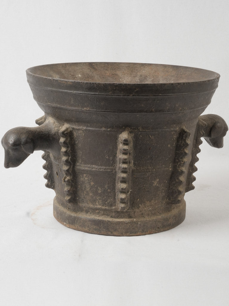 Vintage 17th-century iron mortar