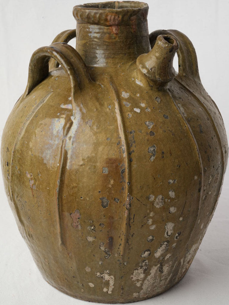 Rustic earthenware vintage oil jar