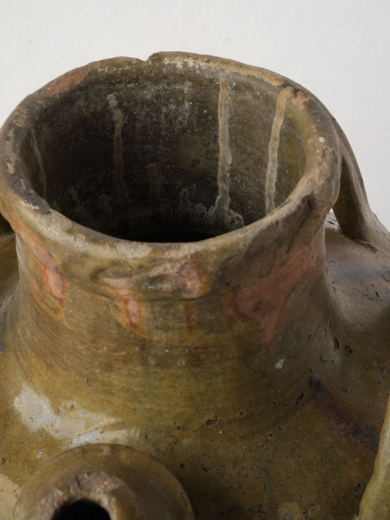Olive-green reflective terracotta jug