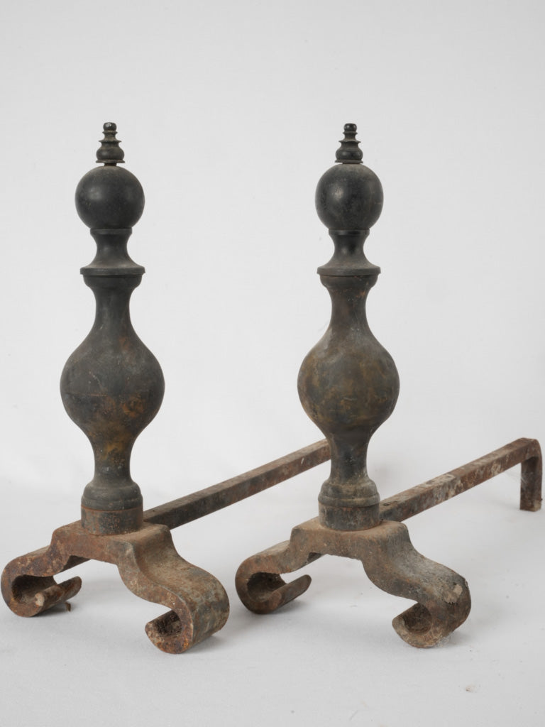 Antique brass-finished French fire dogs