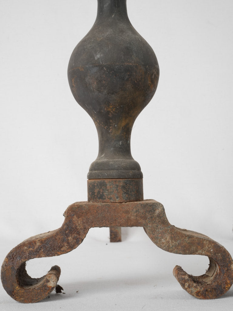 Decorative finial adorned fireplace firedogs