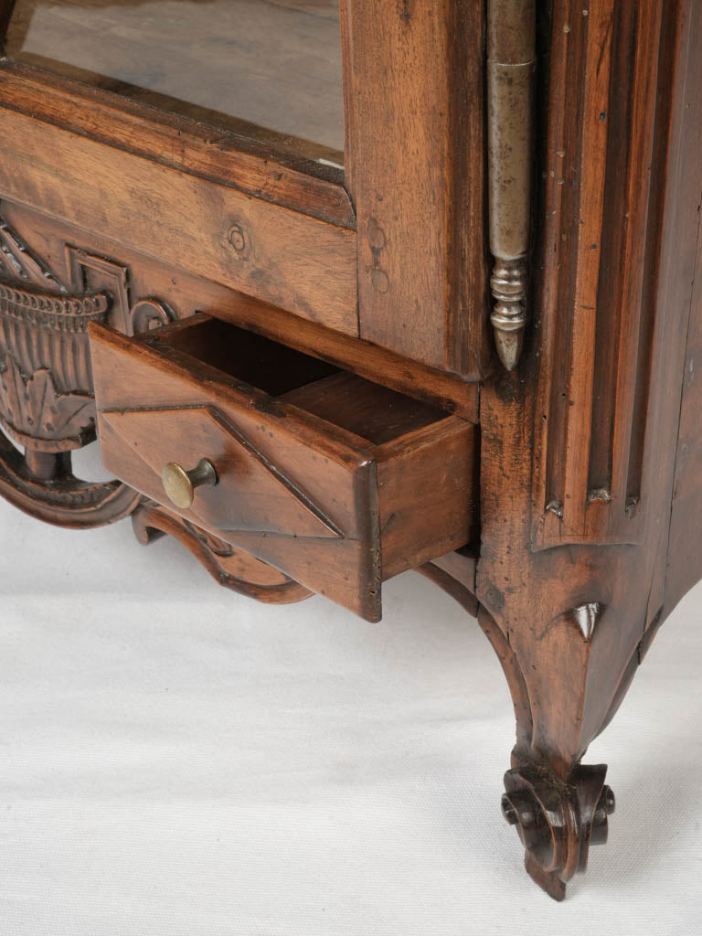 Decorative gendarme hat cornice cabinet