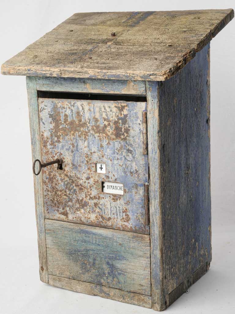 Antique weathered wooden letter box