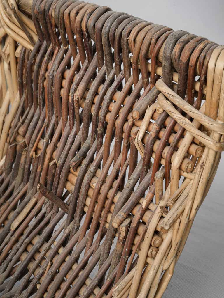 Graceful arched handle woven basket