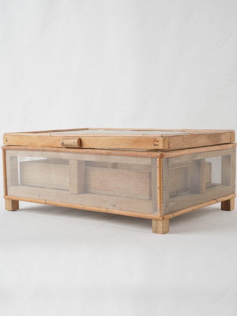 Stylish wooden cheese house with mesh