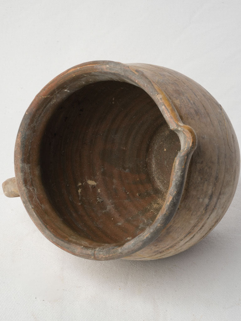 Textured ovoid French container