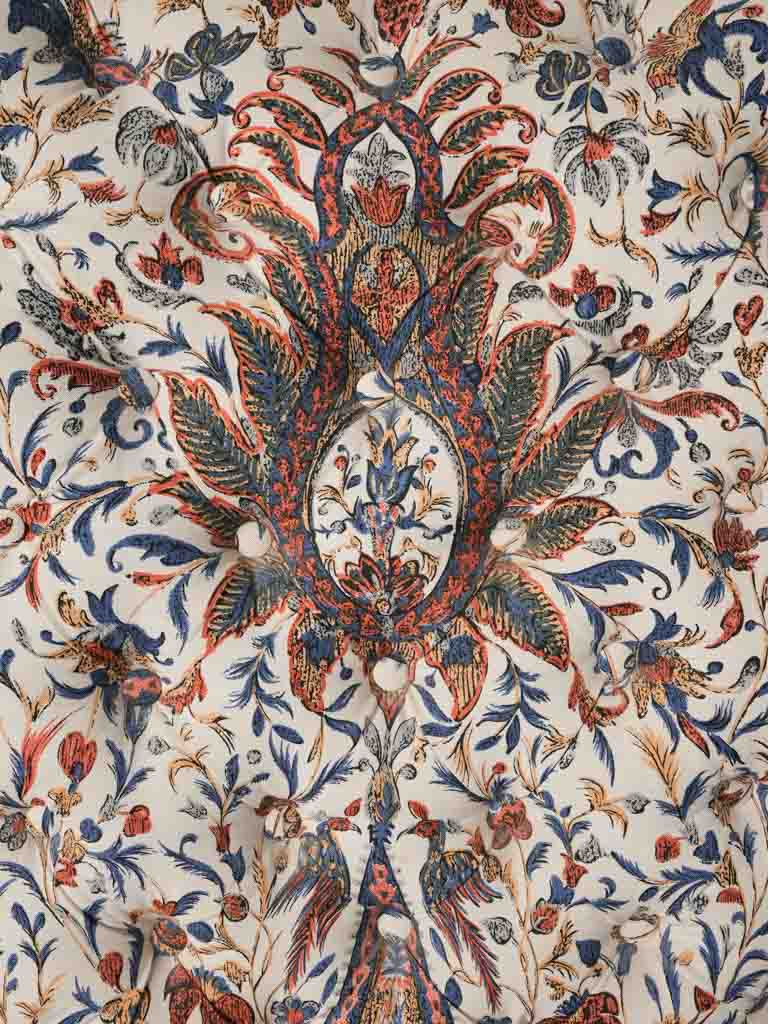 Upholstered chairs with scrolled backs