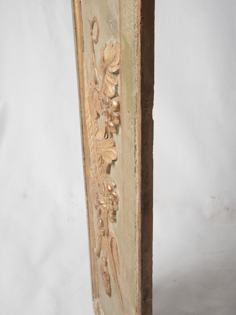 Aged gilded wooden panel with patina