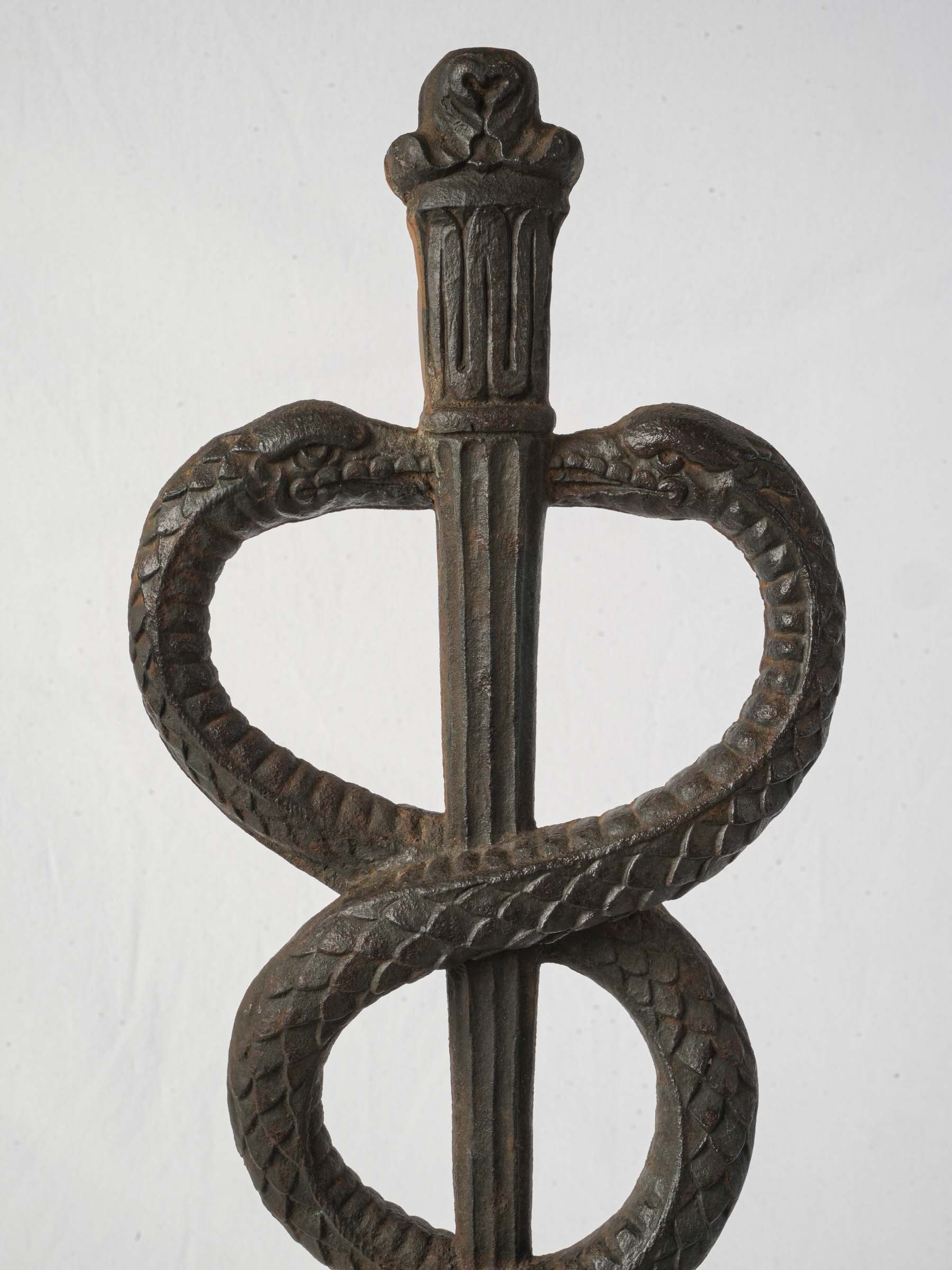 Timeworn patina caduceus sculpture