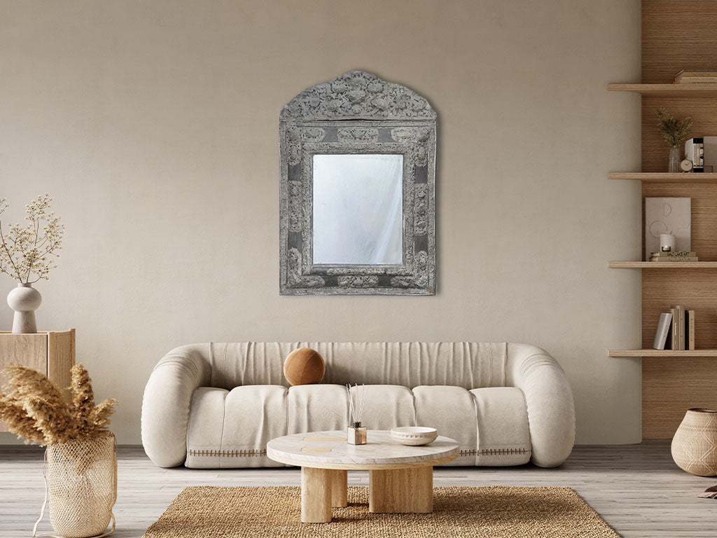 One-of-a-kind aged repoussé zinc mirror