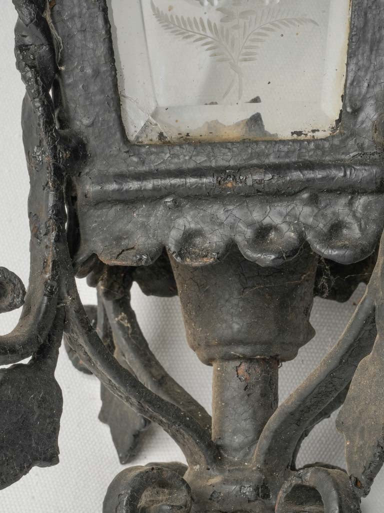 Textured centuries-old iron lantern
