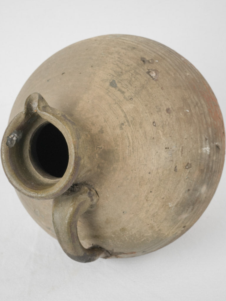 European vintage half-glazed ceramic jug