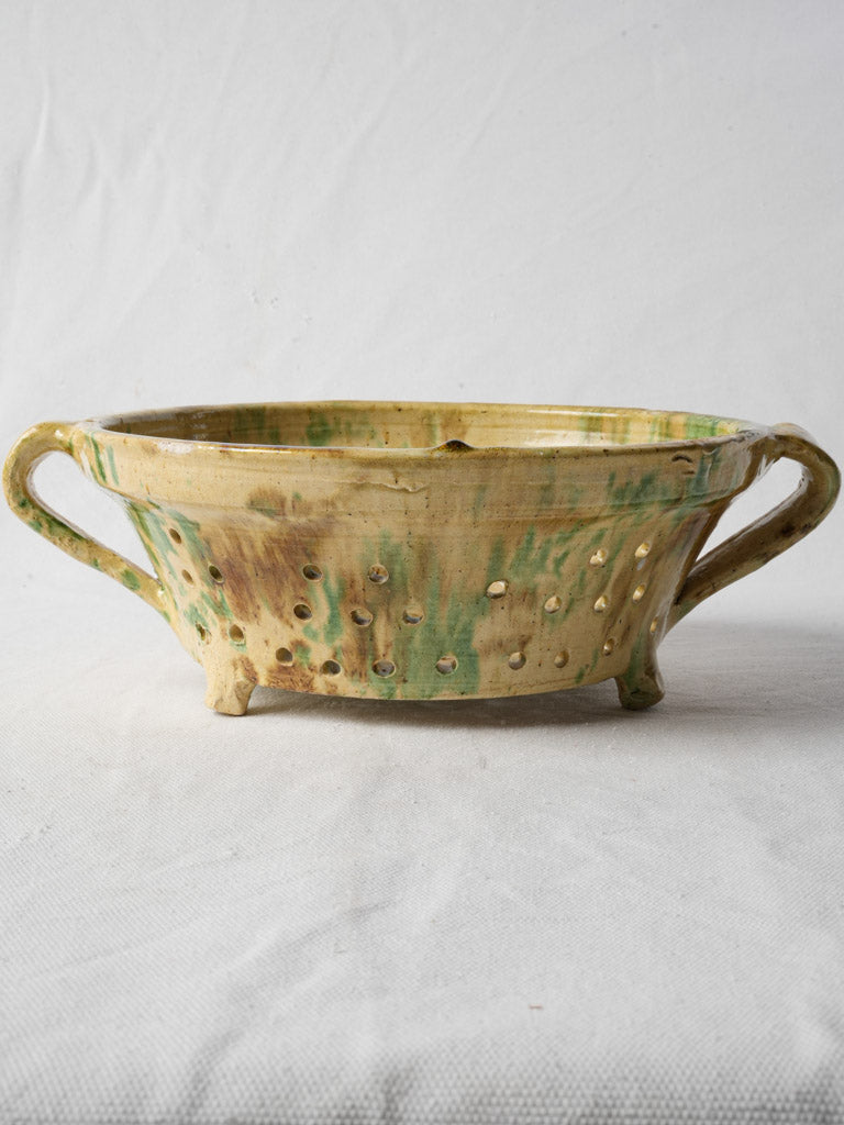 Warm browns green hues colander