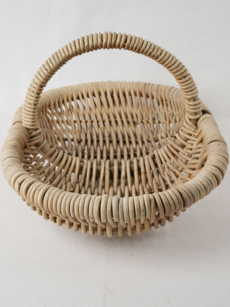 Charming aged wicker garden basket