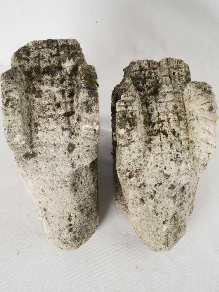 Pair of salvaged carved stone ram heads from a church 14¼"