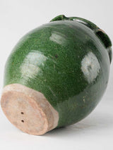 Time-worn four-grip pottery olive pot