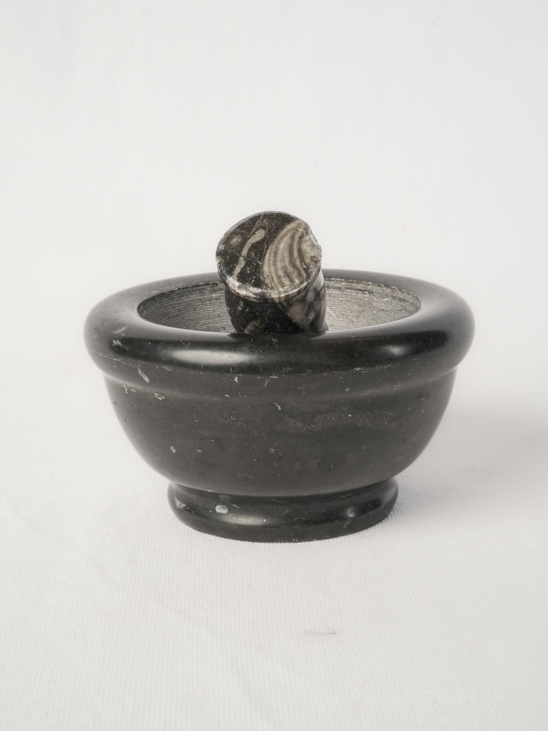 19th-century sculptural marble pestle set
