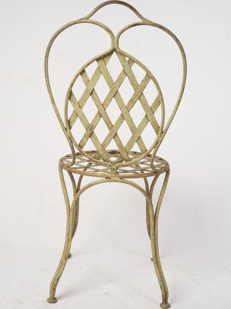 Distressed elegant silhouette iron chairs