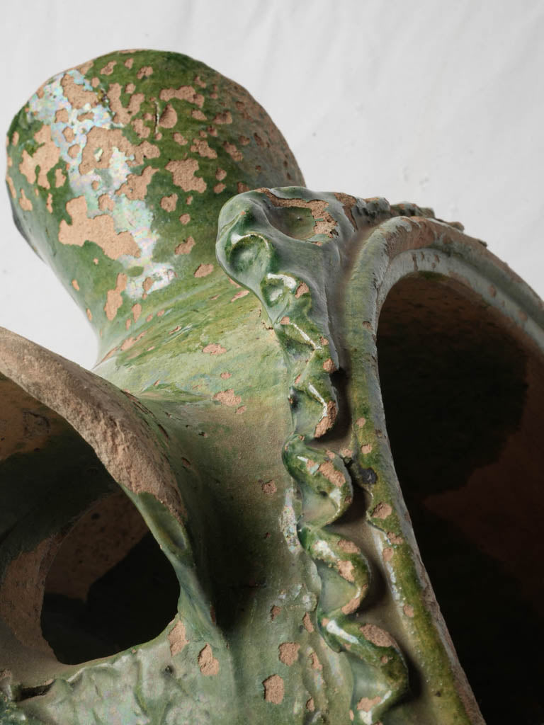Old-world cat access sculpture
