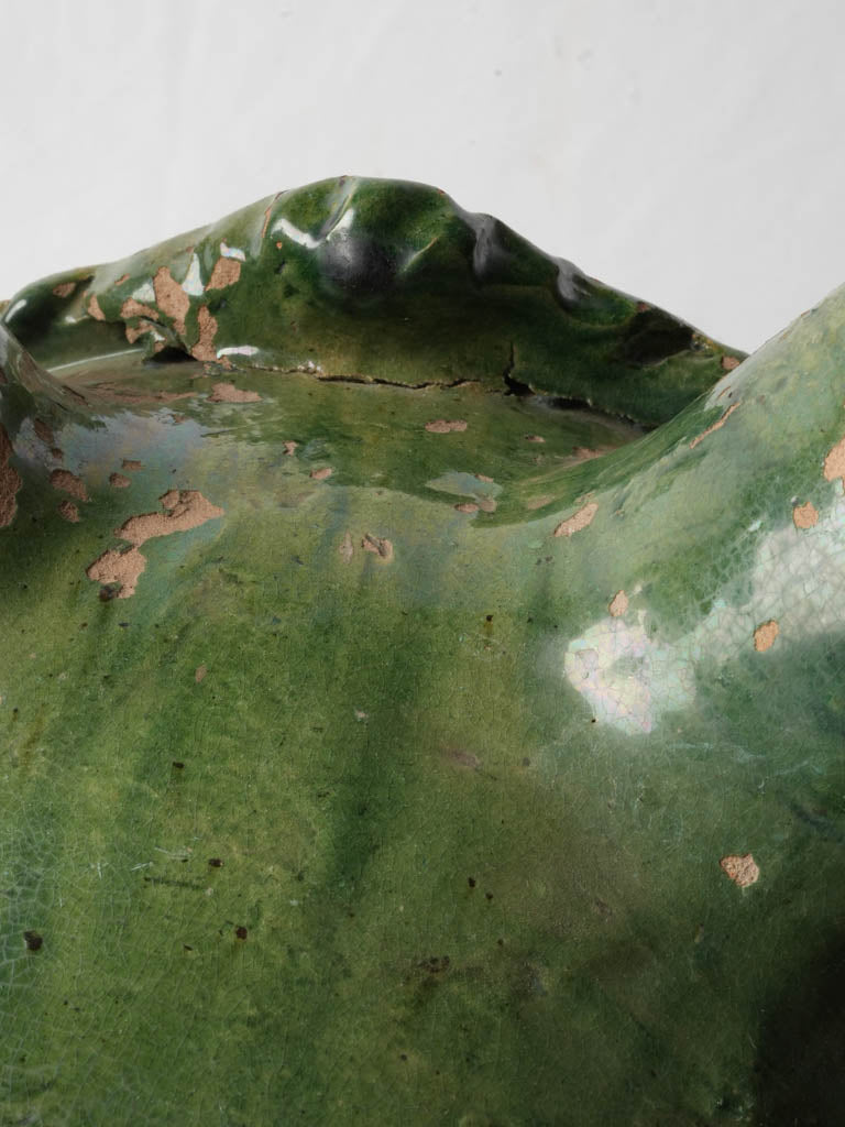 Handsome timeworn green terracotta