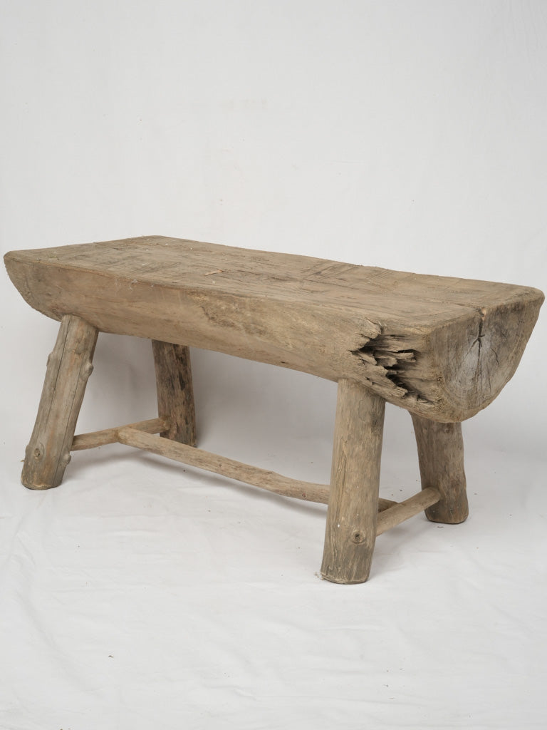 Distinctive reclaimed log coffee table