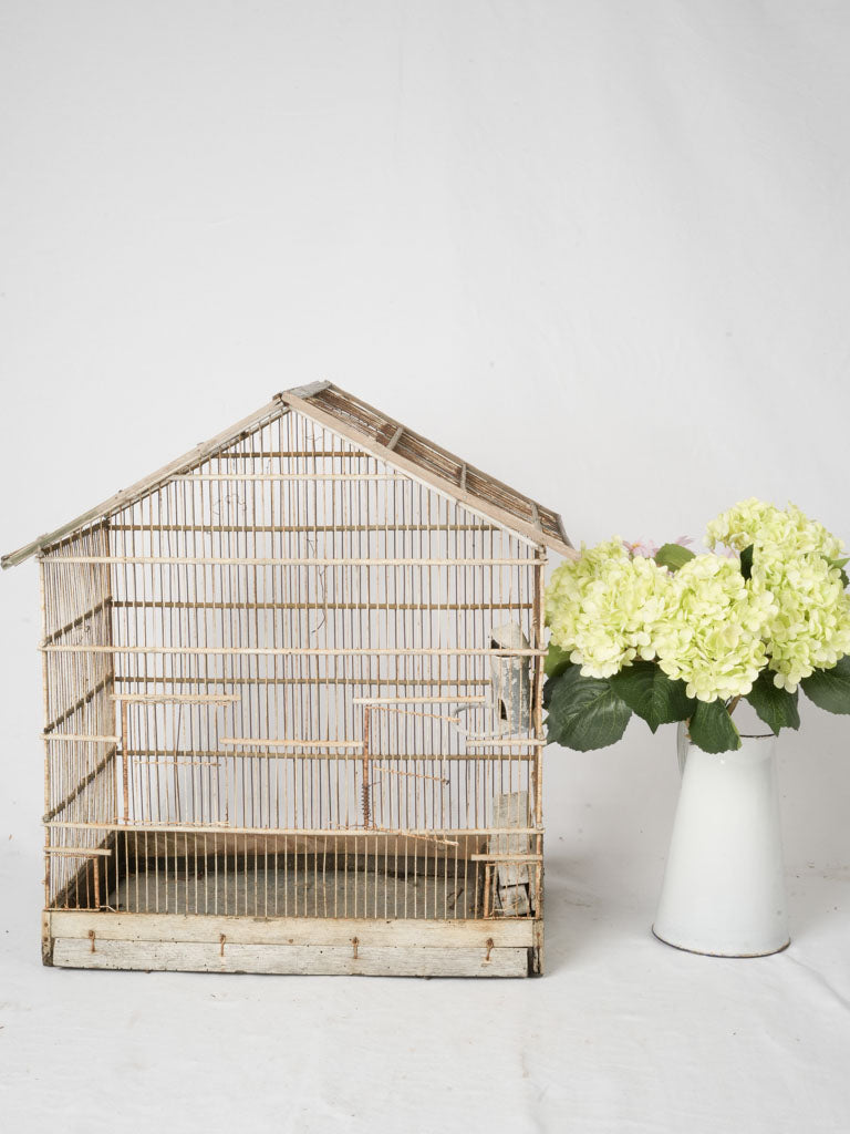 Vintage rustic wooden birdcage craftsmanship