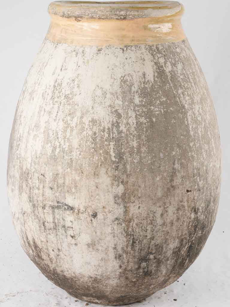 Aged patinated olive oil jar
